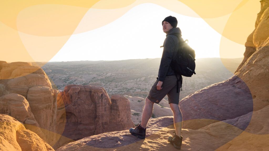 Man hiking in mountainous desert