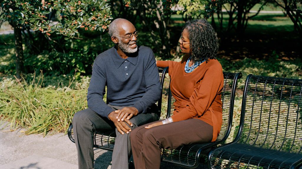 Couple laughing together, after they successfully worked through communication problems in marriage