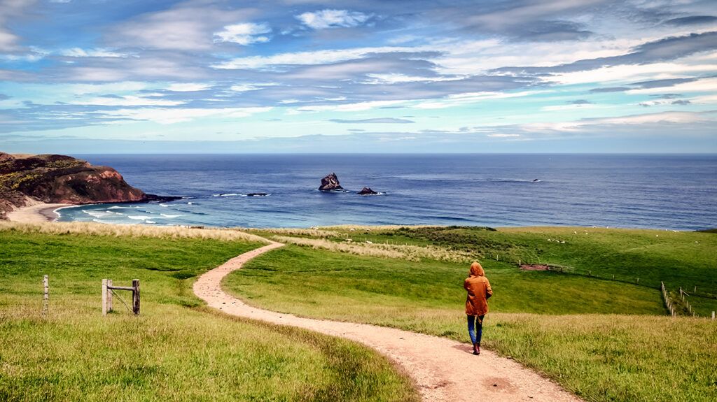 Woman walking her path, contemplating what stage of change she is in