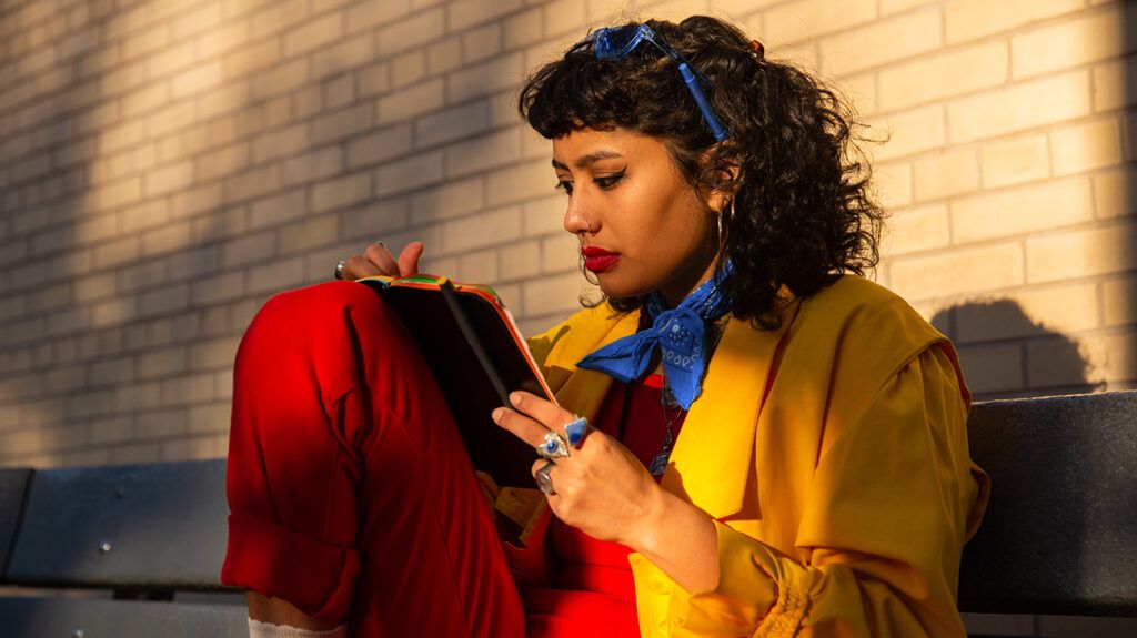 Woman writing in a notebook